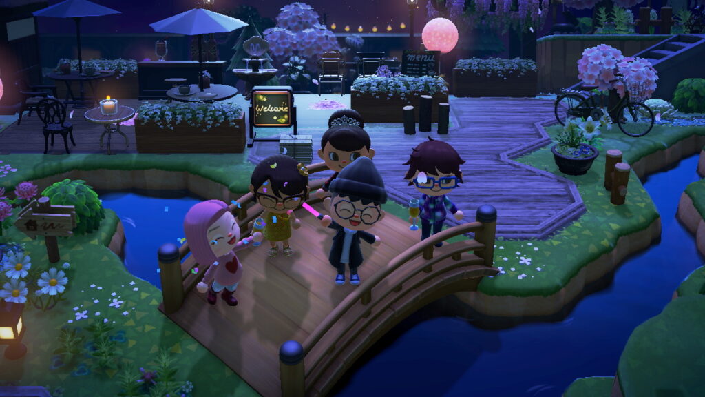 AC characters celebrating on a bridge